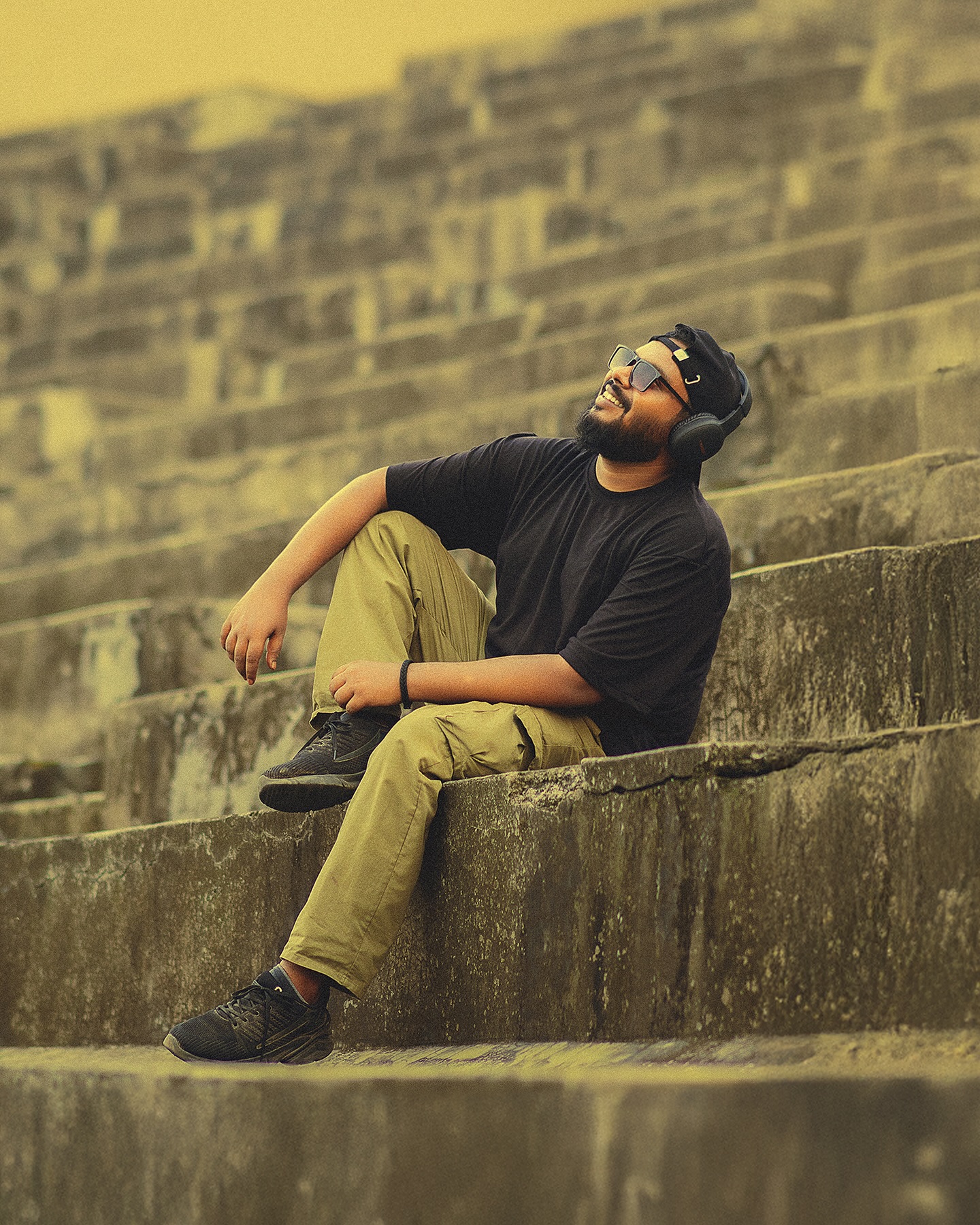 Moody street portrait by Asim Poddar — a character study lit like a film still in Kolkata