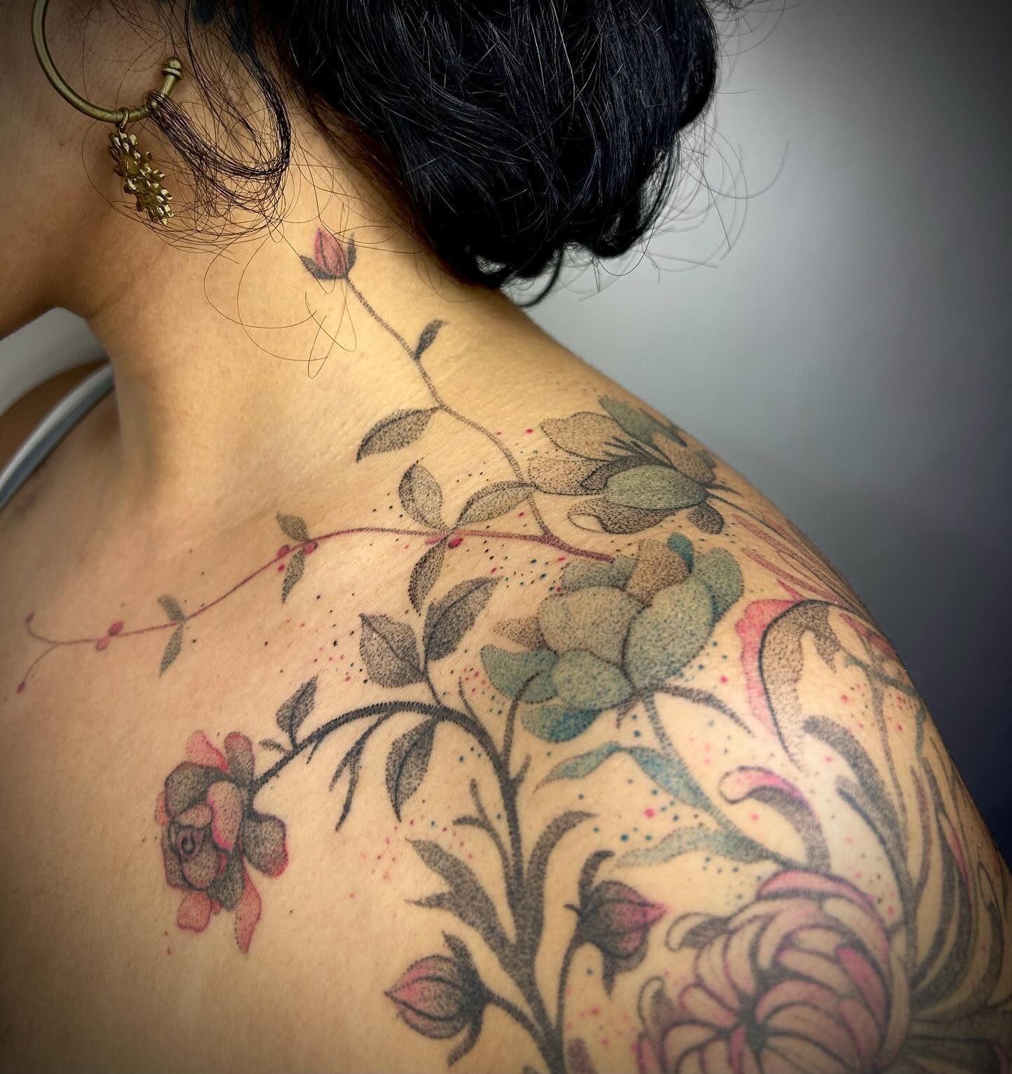 Botanical handpoke tattoo by Shivani (@stickitytats)